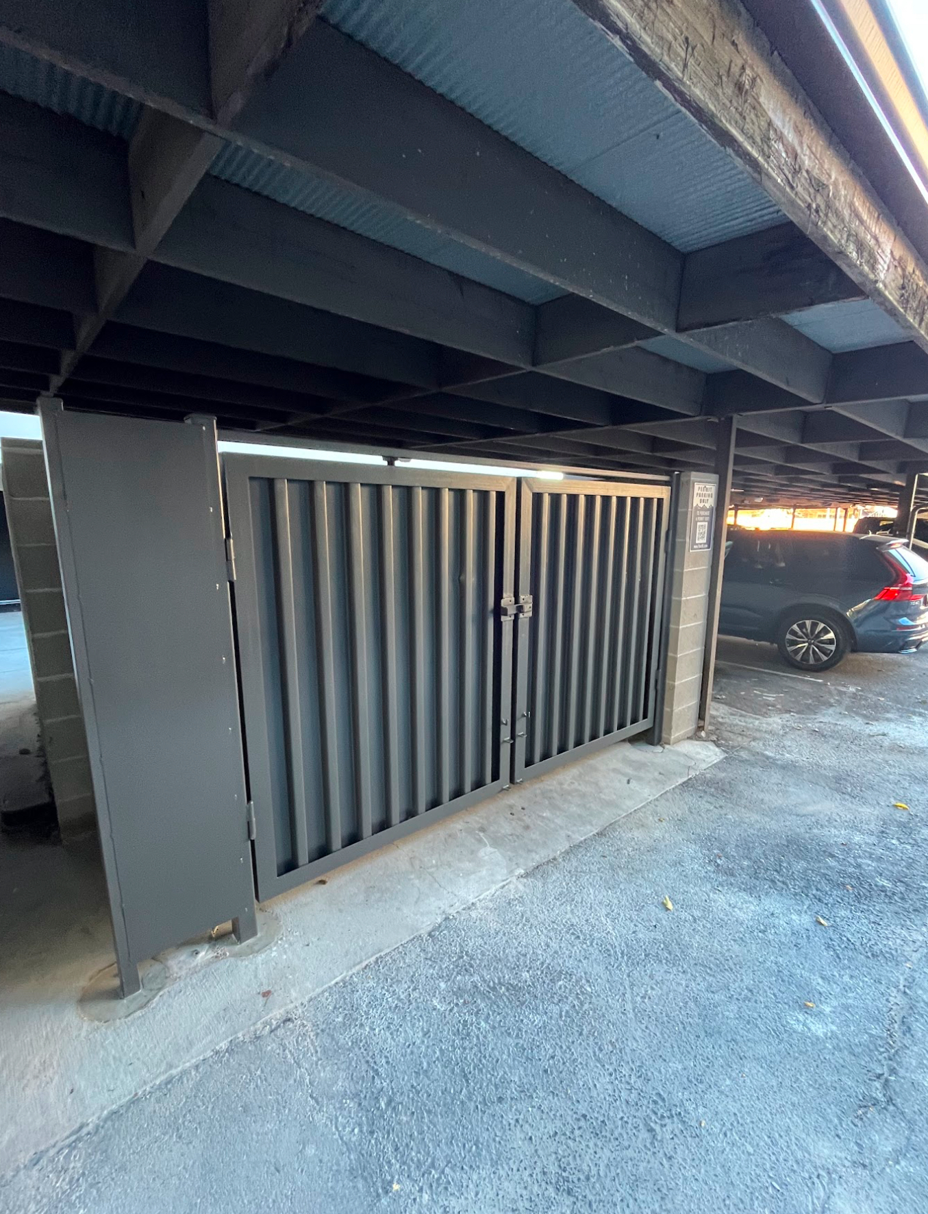 Custom steel parking garage storage gate and enclosure panels