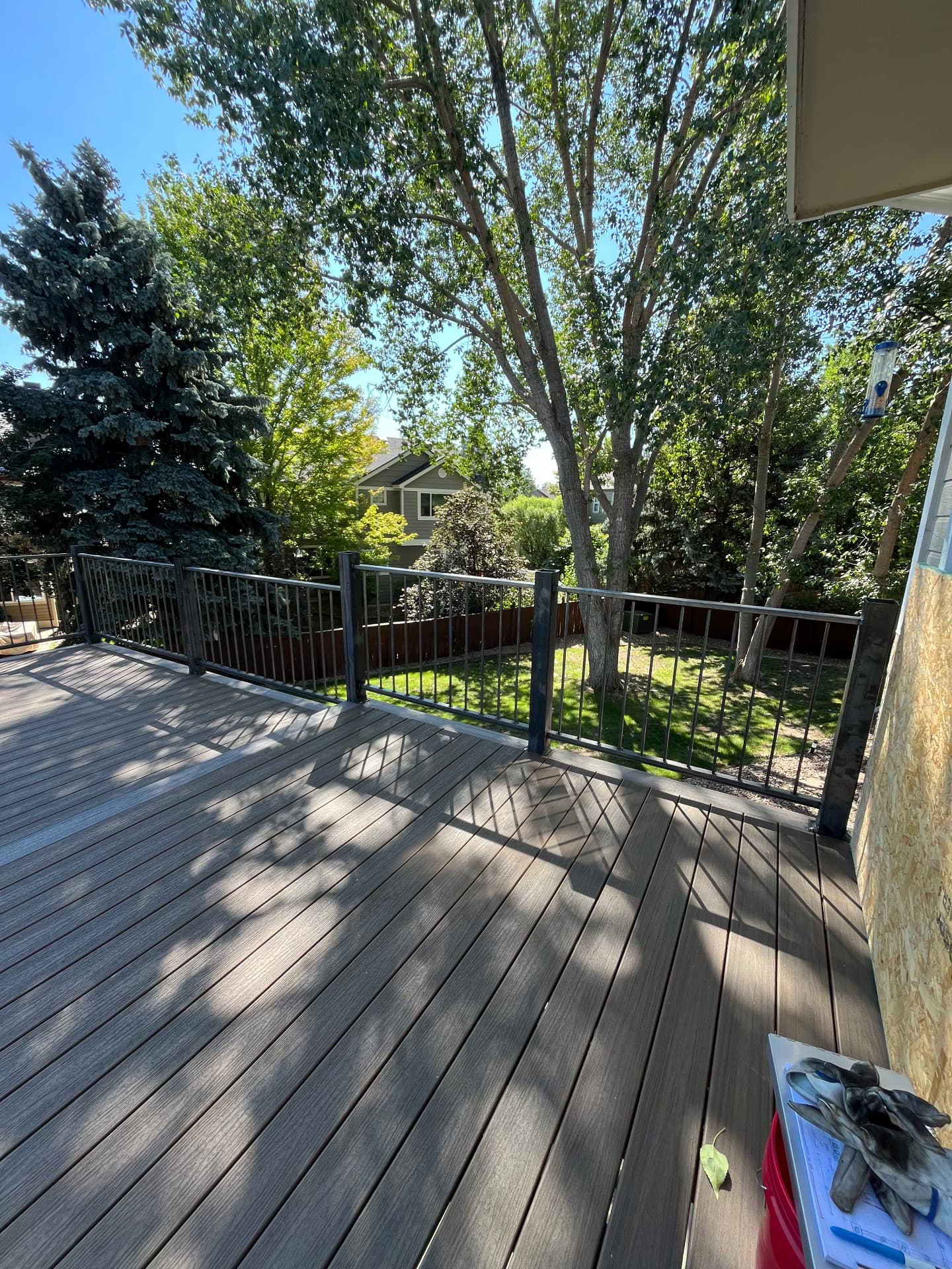 Custom black steel guardrail installed on new composite deck