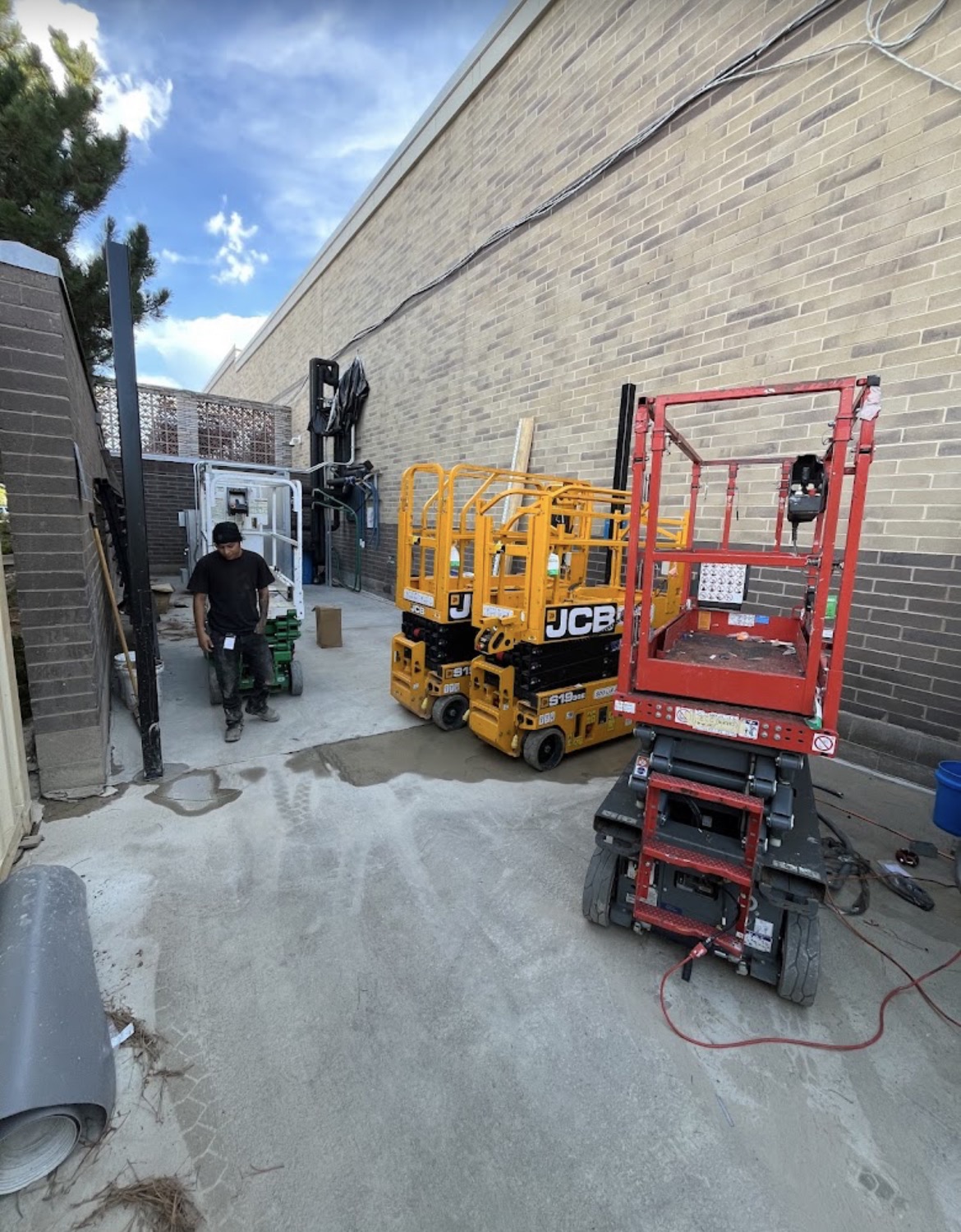 Commercial job site with lifts and steel work