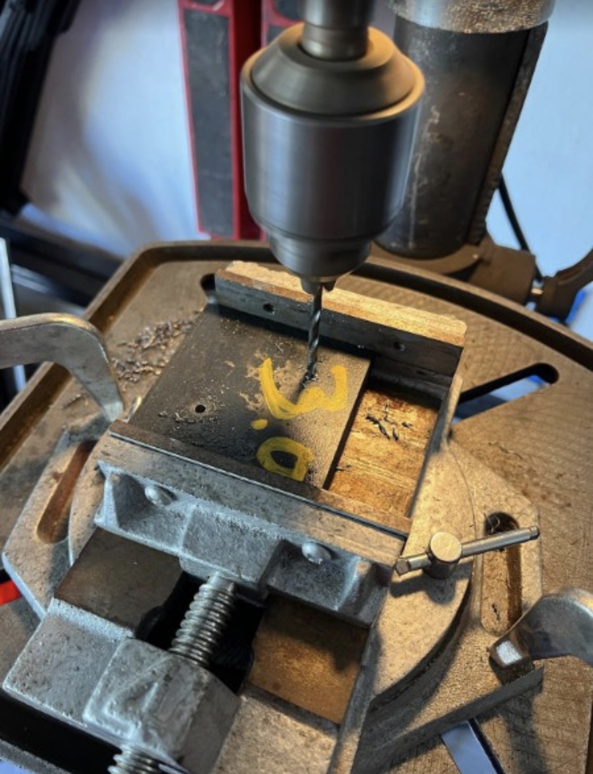 Precision drilling steel plate on drill press