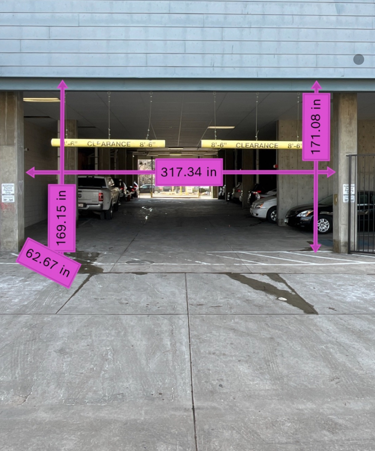 Parking garage entrance measured for custom steel security gate
