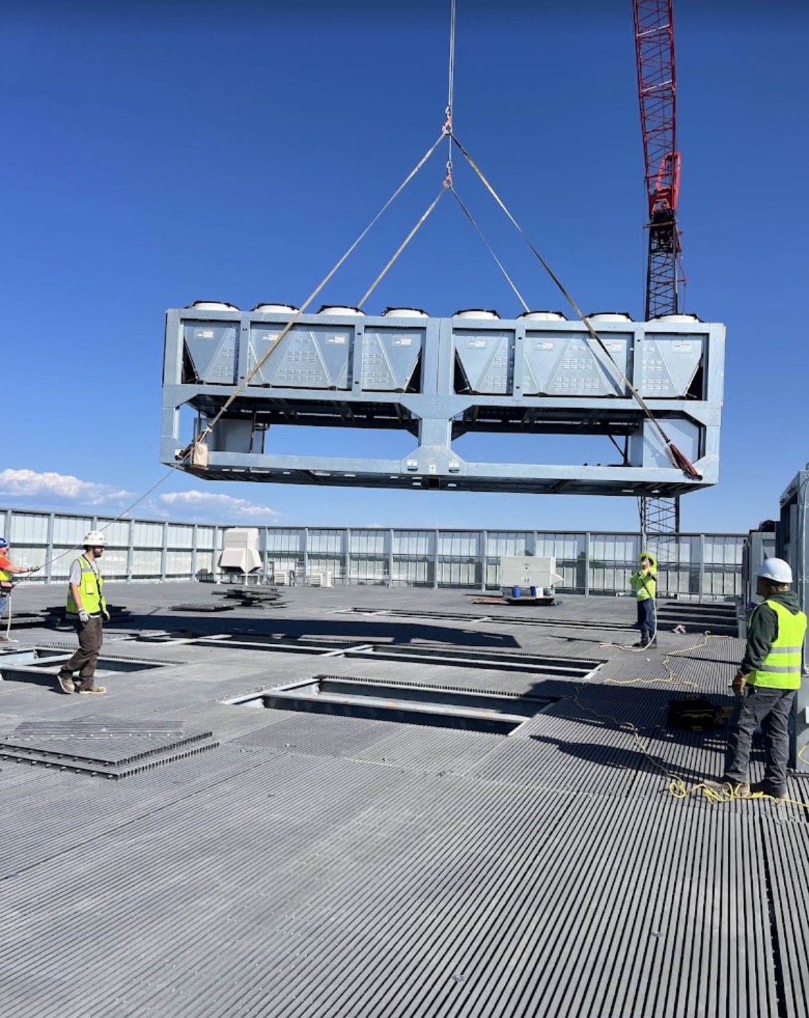 Rooftop steel frame supporting chiller unit lift