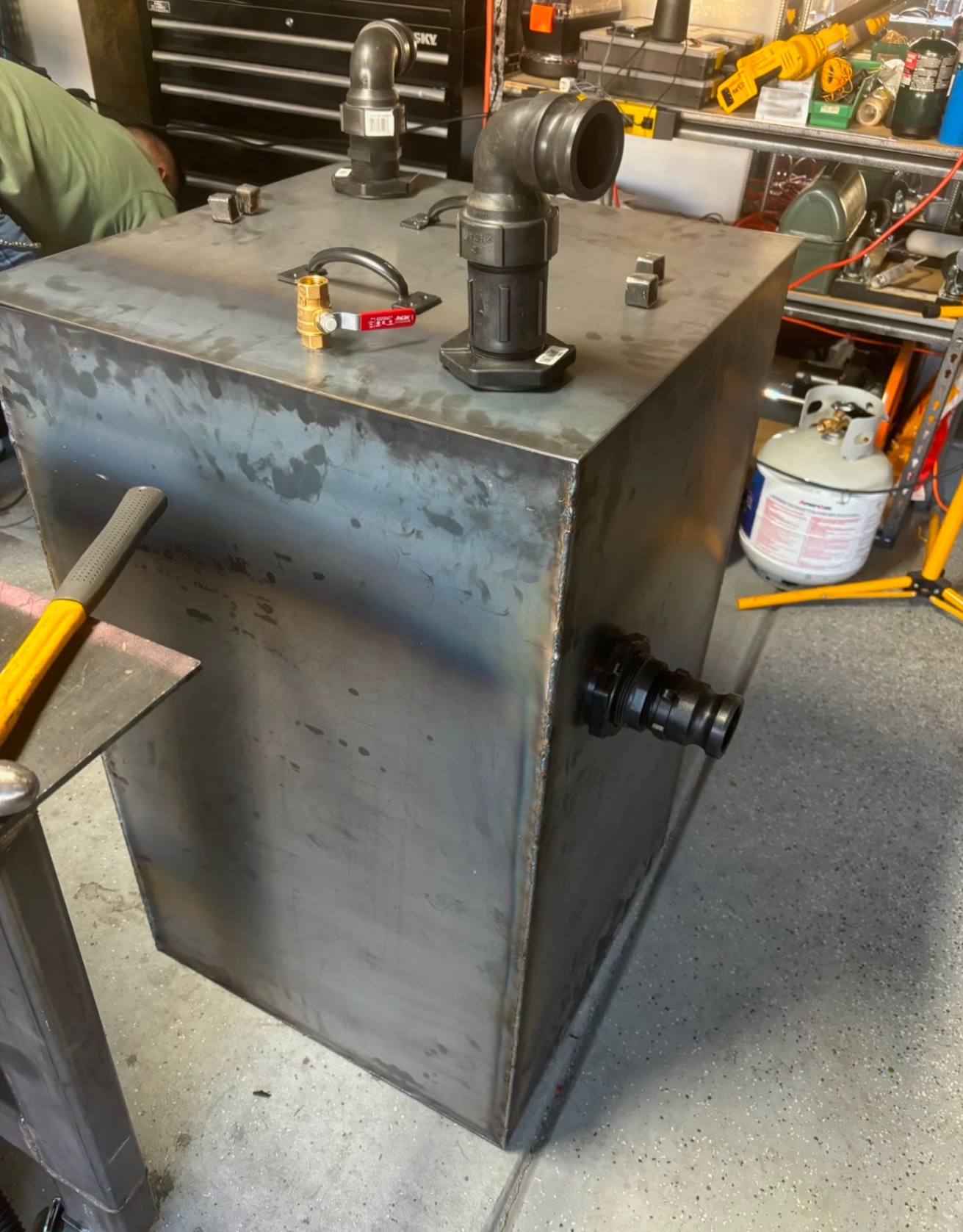 Custom fabricated steel water tank with bulkhead fittings and ball valve